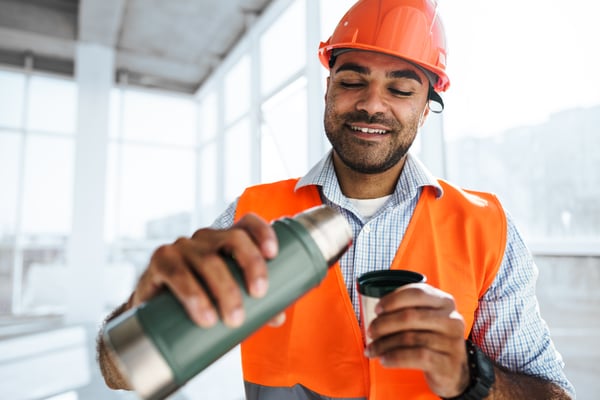 portrait-of-a-man-worker-in-workwear-on-a-break-dr-2023-11-27-04-58-42-utc